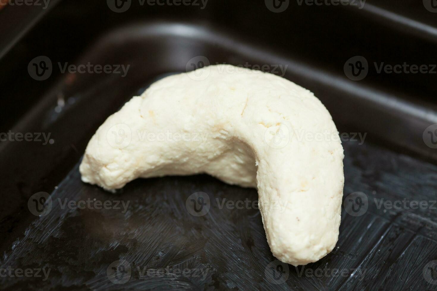 Raw colombian cassava bread on baking sheet ready to be baked. Pandeyuca photo