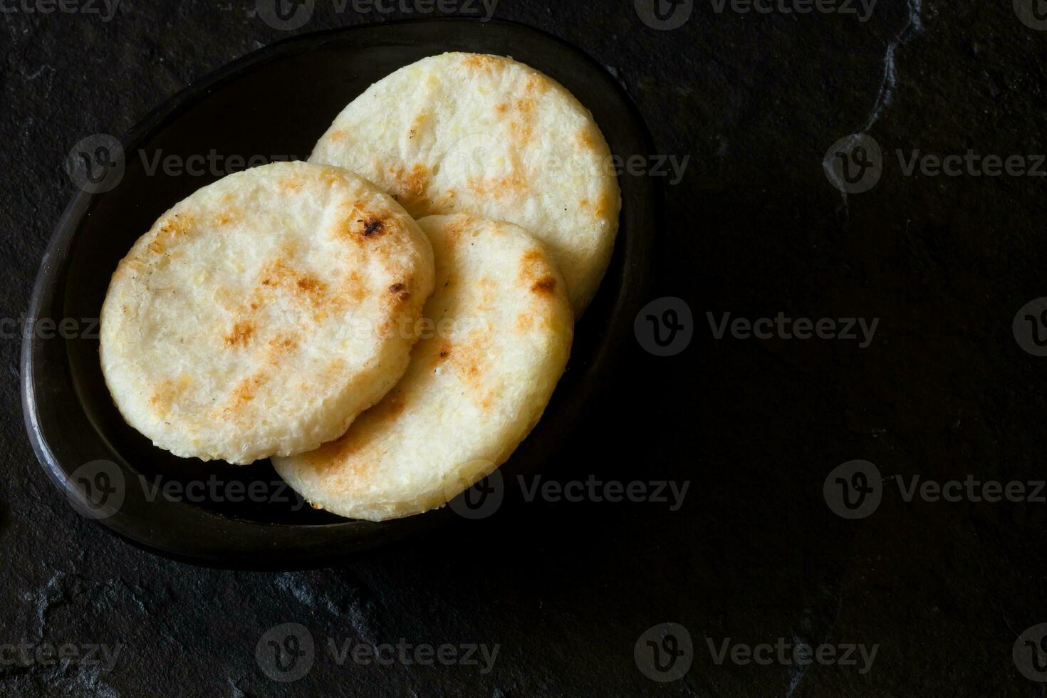 Roasted traditional Colombian white corn arepa photo