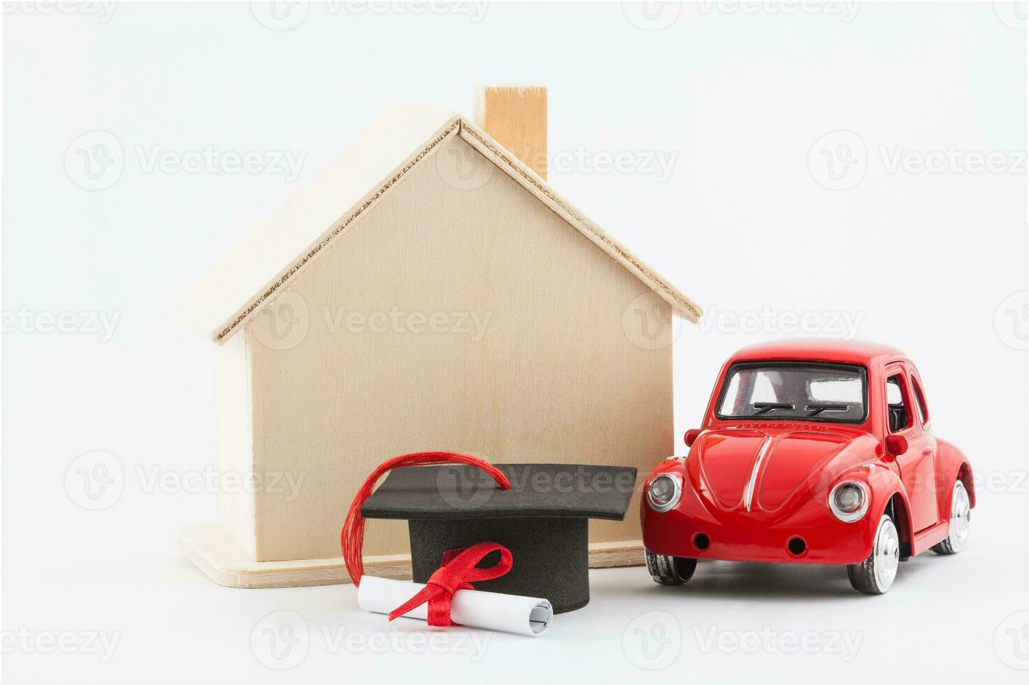 Financial life goals concept. Car, house and scholarship isolated on white background photo