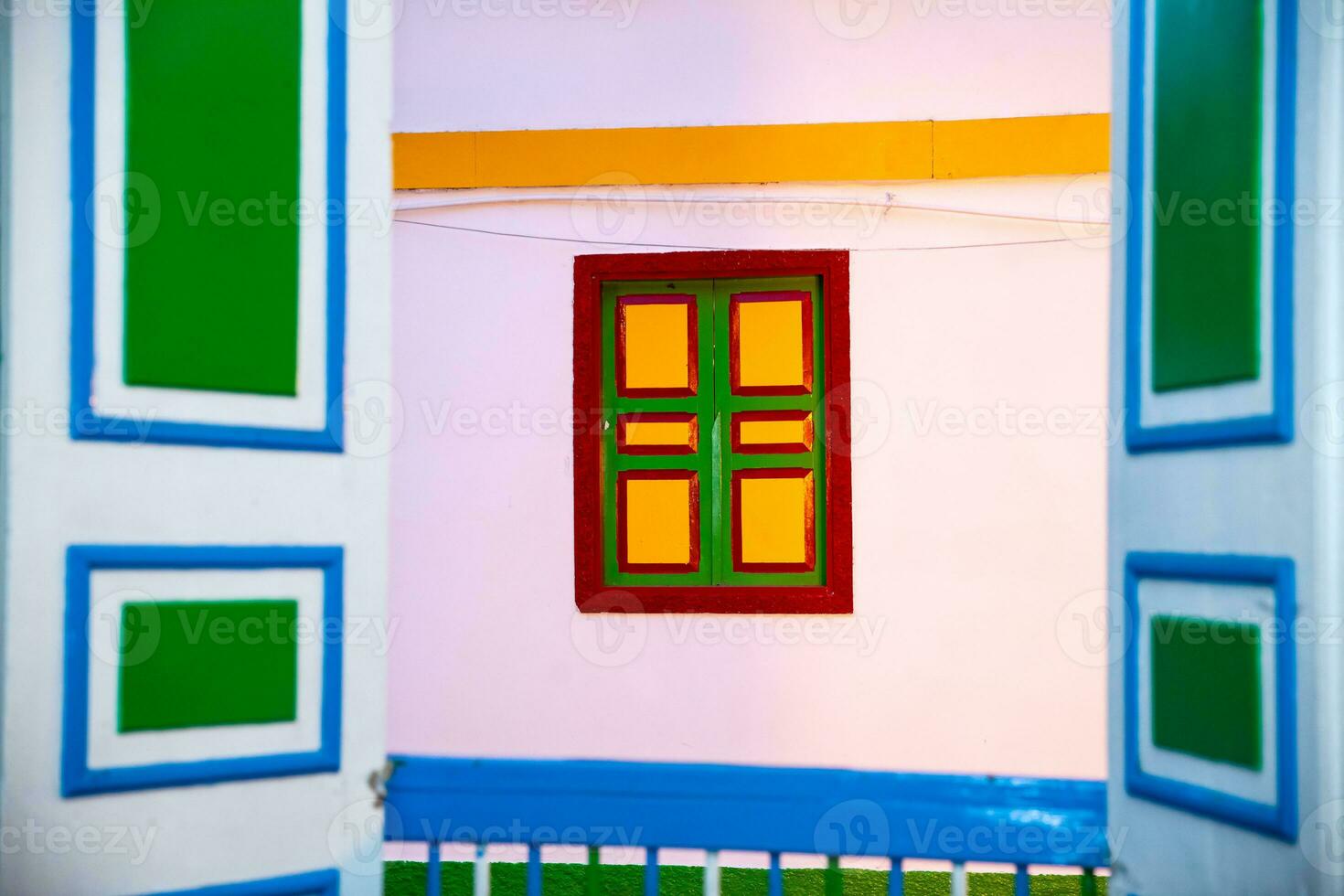 Colorful doors and windows in Salento a beautiful small town located at the Quindio region in Colombia photo