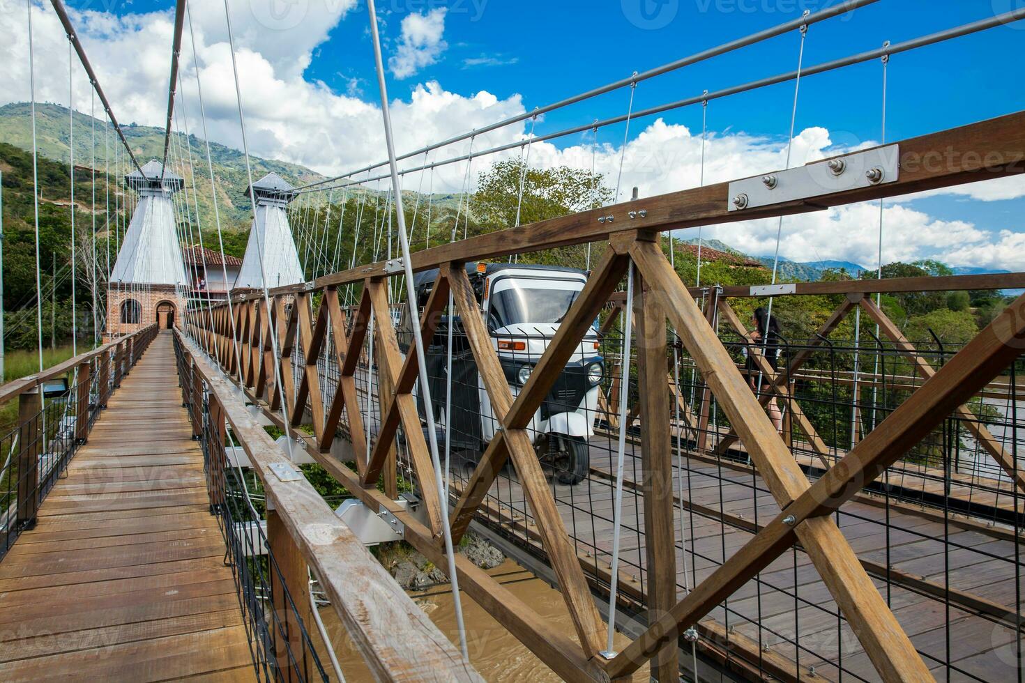 The historical Bridge of the West a a suspension bridge declared Colombian National Monument built in 1887 over the Cauca River photo