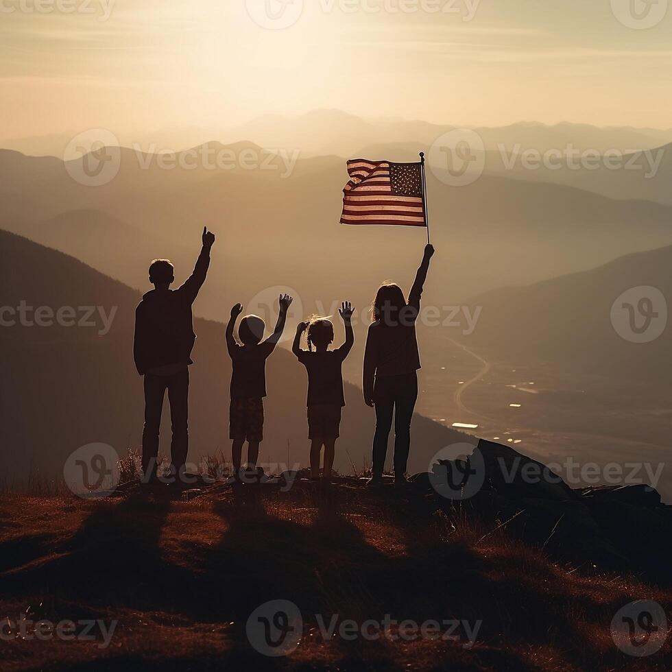 Silhouettes of four children with USA flag in sunset at top of mountain, . photo