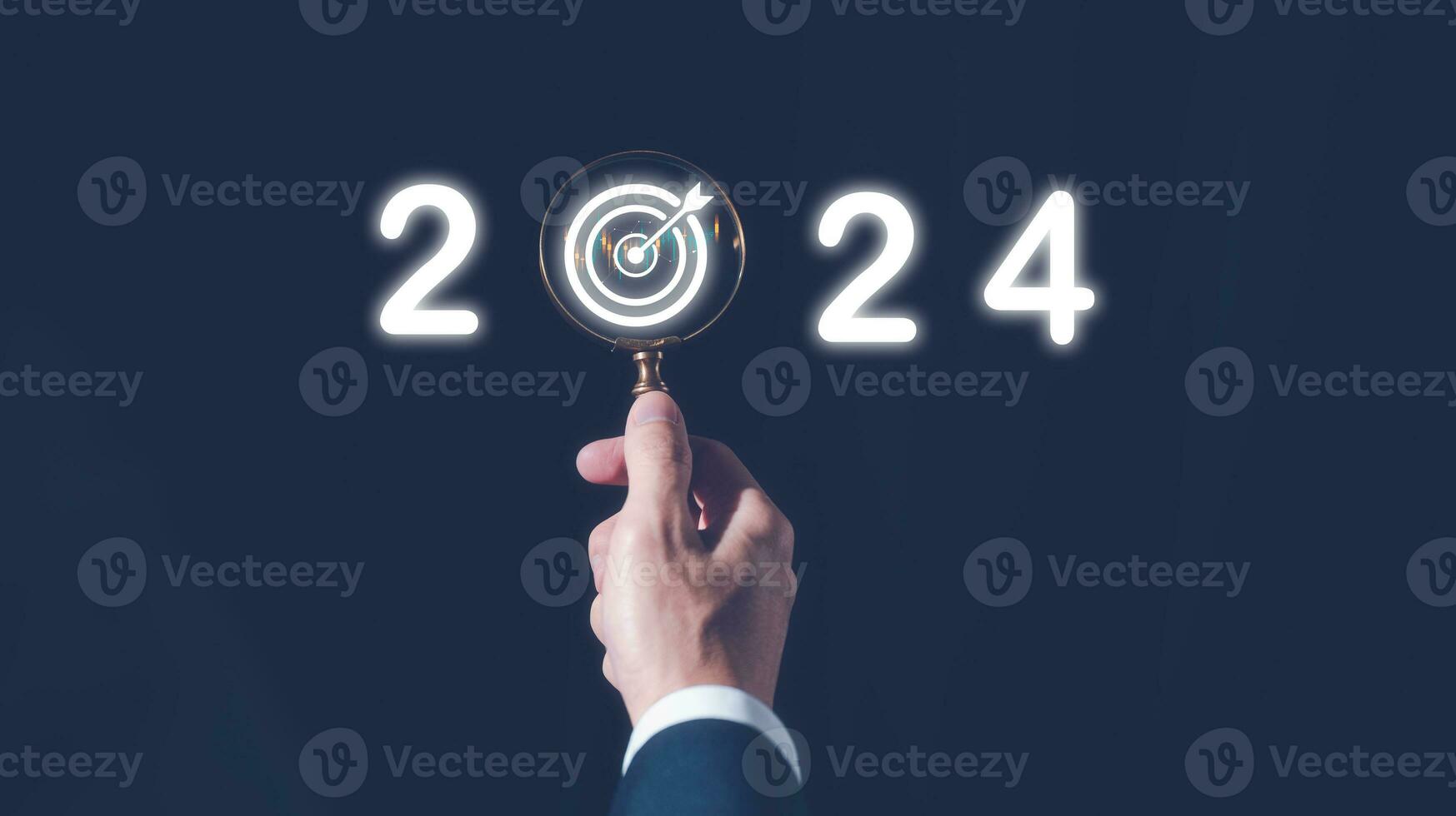 2024 business planning and strategy concept, businessman holding magnifying glass with the year 2024 target darts, marketing financial and research analysis, investment trends next new year photo