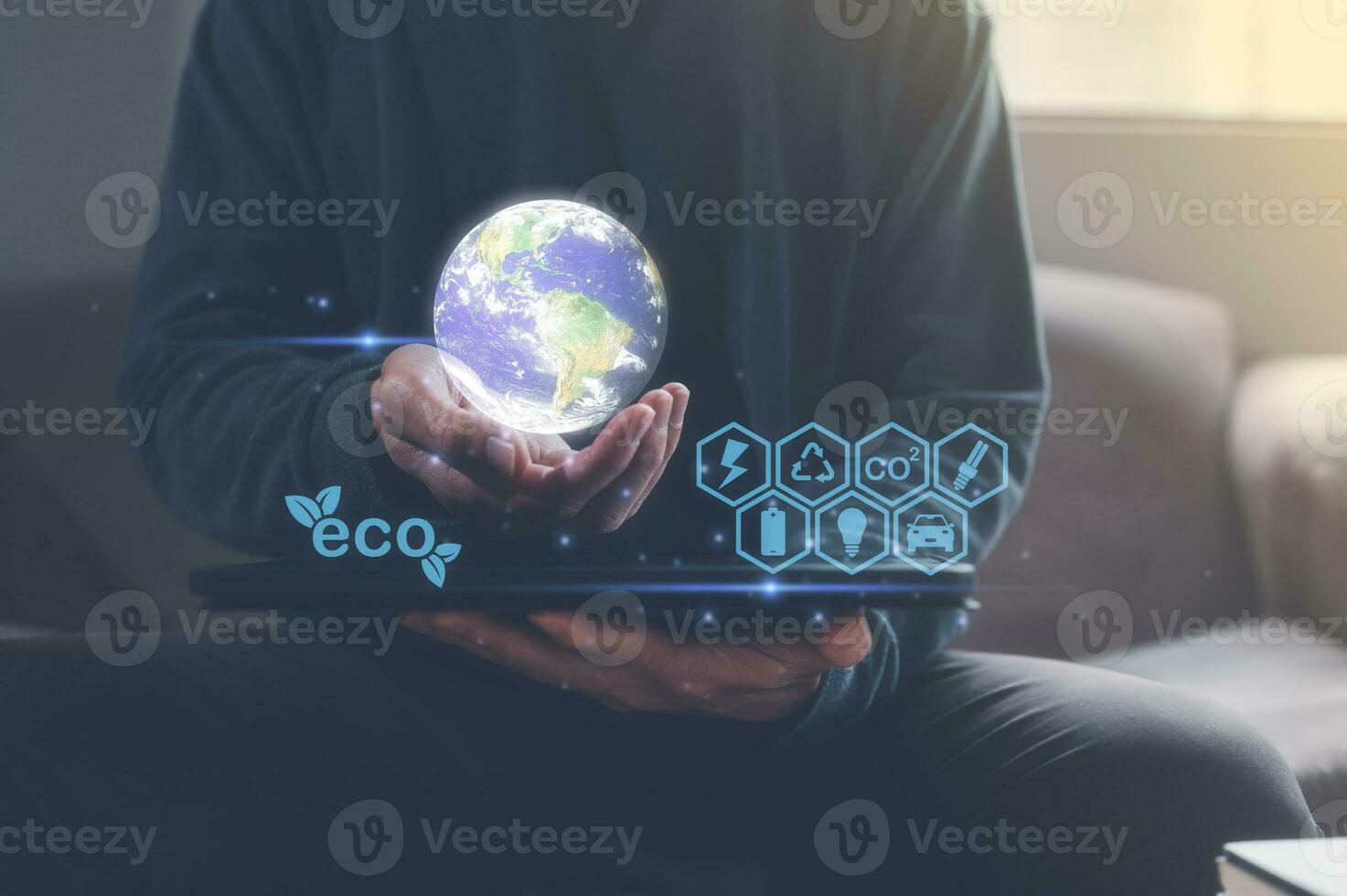 Reduce CO2 emission concept, businessman holding glob in hand for environmental business friendly sustainability industry, recycling, the elements of this image furnished by nasa photo