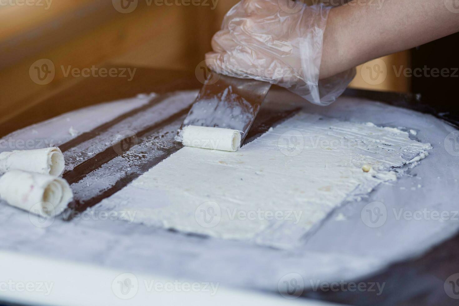 cooking stir-fried ice cream on a freeze pan photo