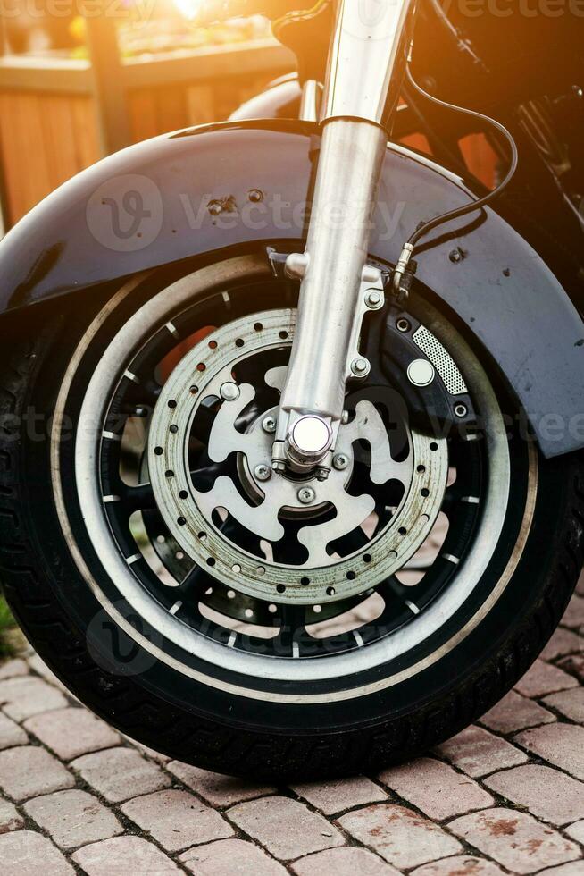 Wheel of classic motorcycle. photo