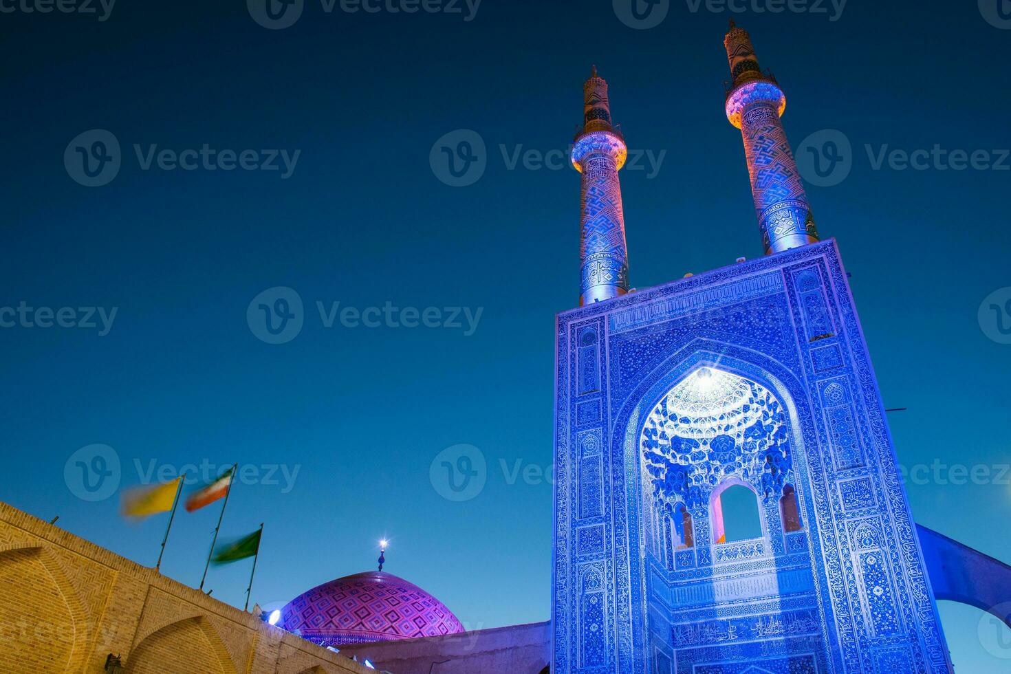 Blue Hazireh Mosque during night in Yazd, Iran. Blue hour isolated low angle shot. photo