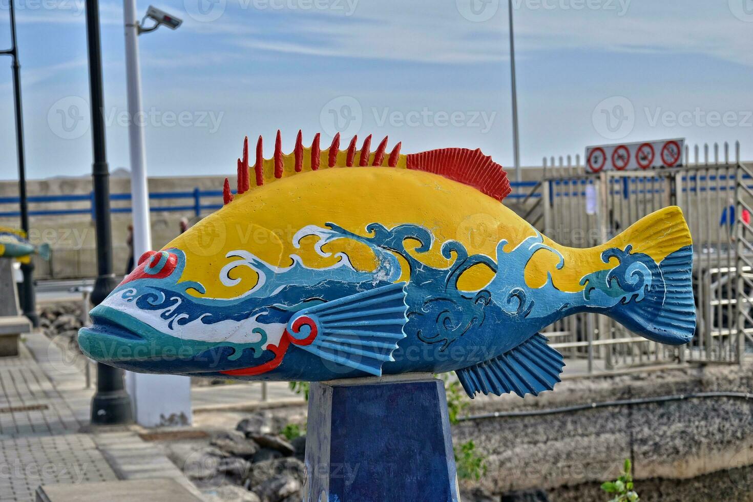 colorful fun fish monuments in the port of Corralejo, Spain photo