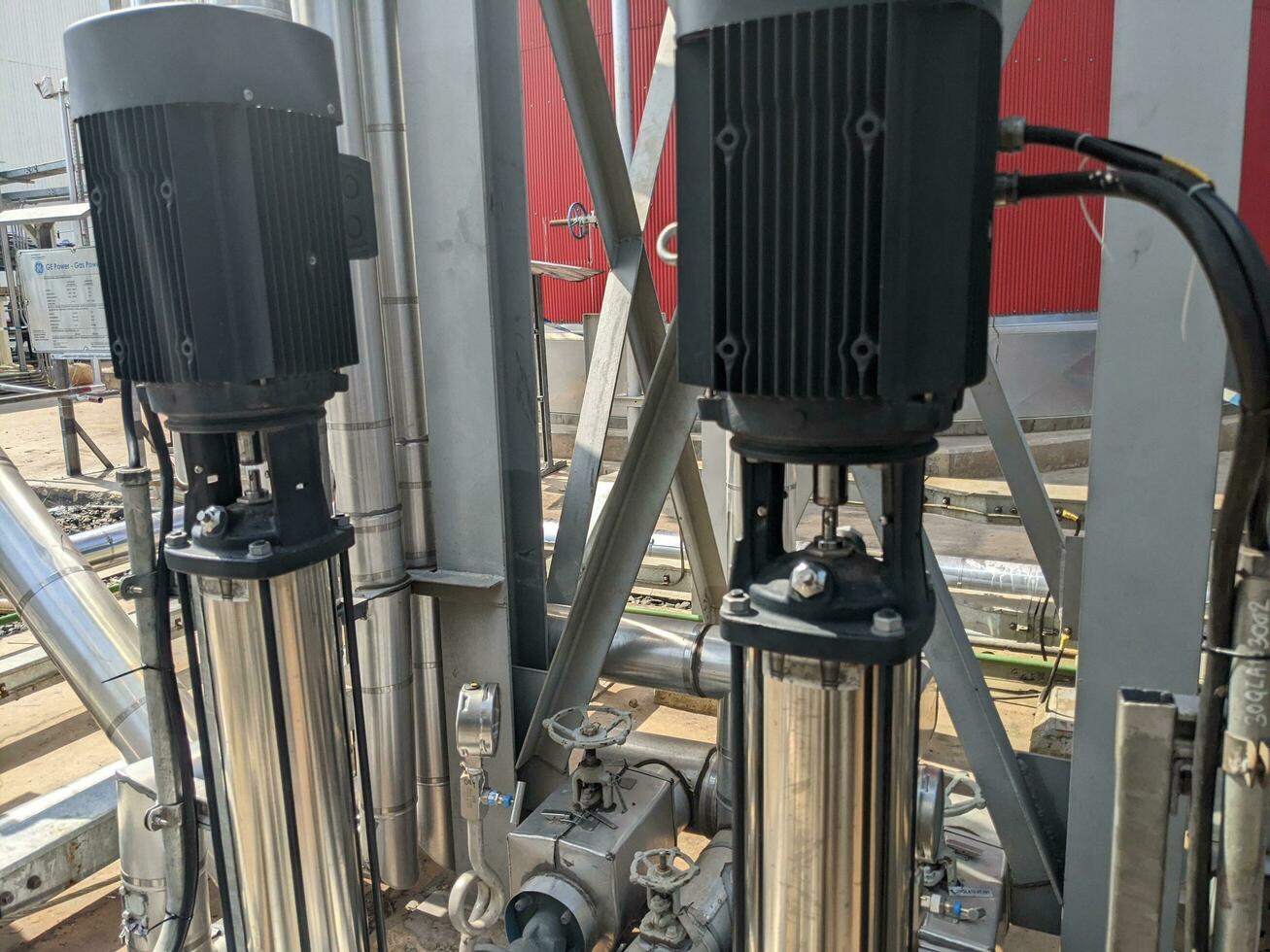 Vertical motor during uncouple conection preparation for solo run test. The photo is suitable to use for industry background, construction poster and safety content media.