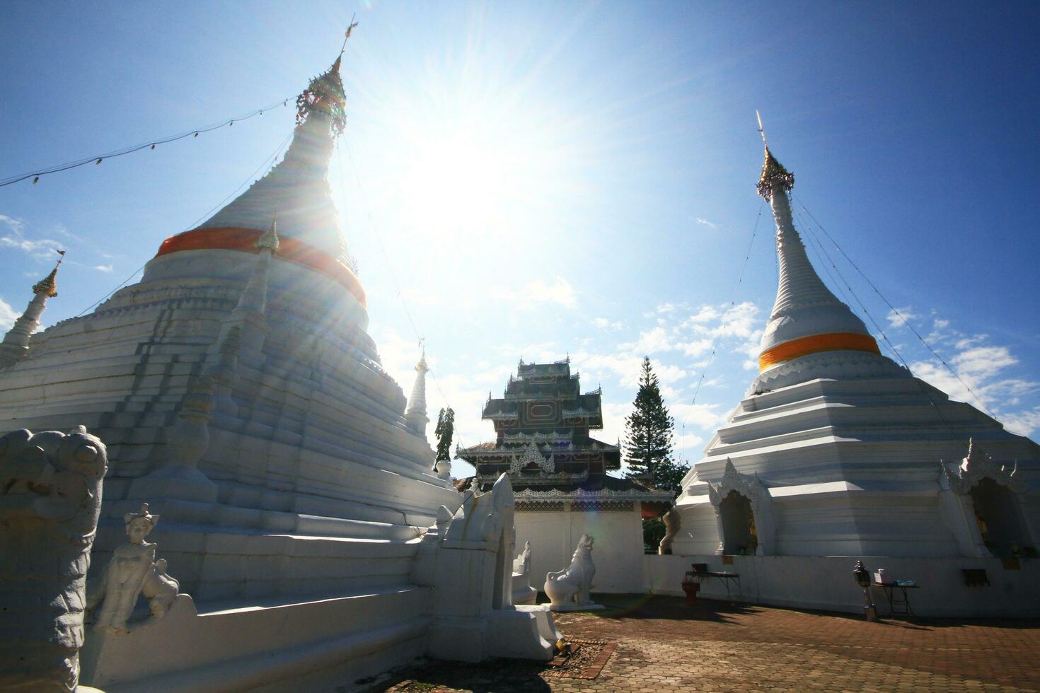 Beautiful White Pagoda with blue sky in Phra That Doi Kong Mu Temple on the mountain in northern at Meahong Son Province, Thailand photo