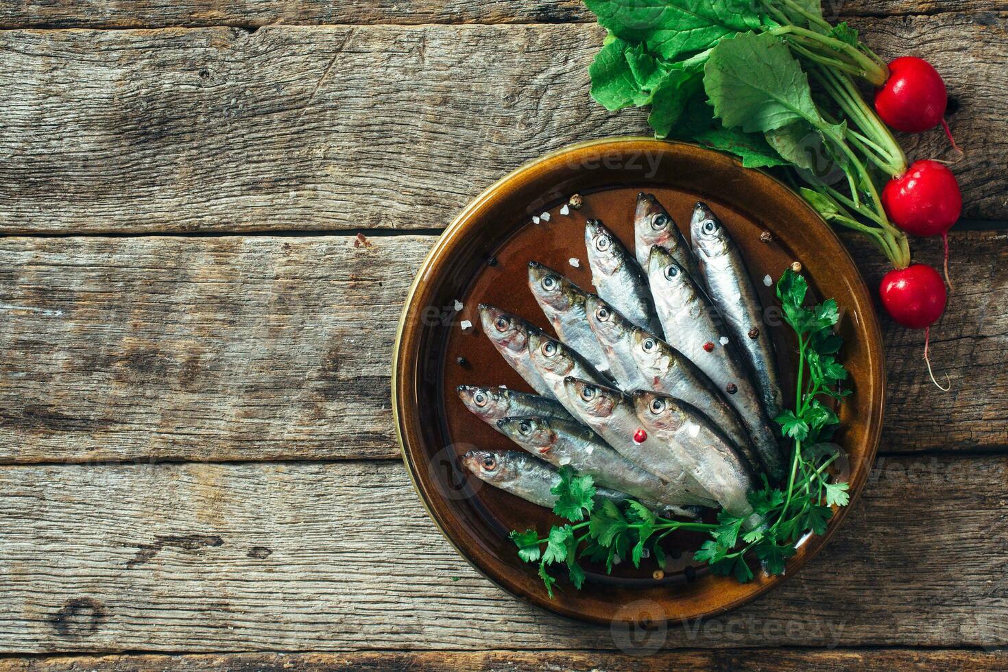 Raw smelt fishes photo