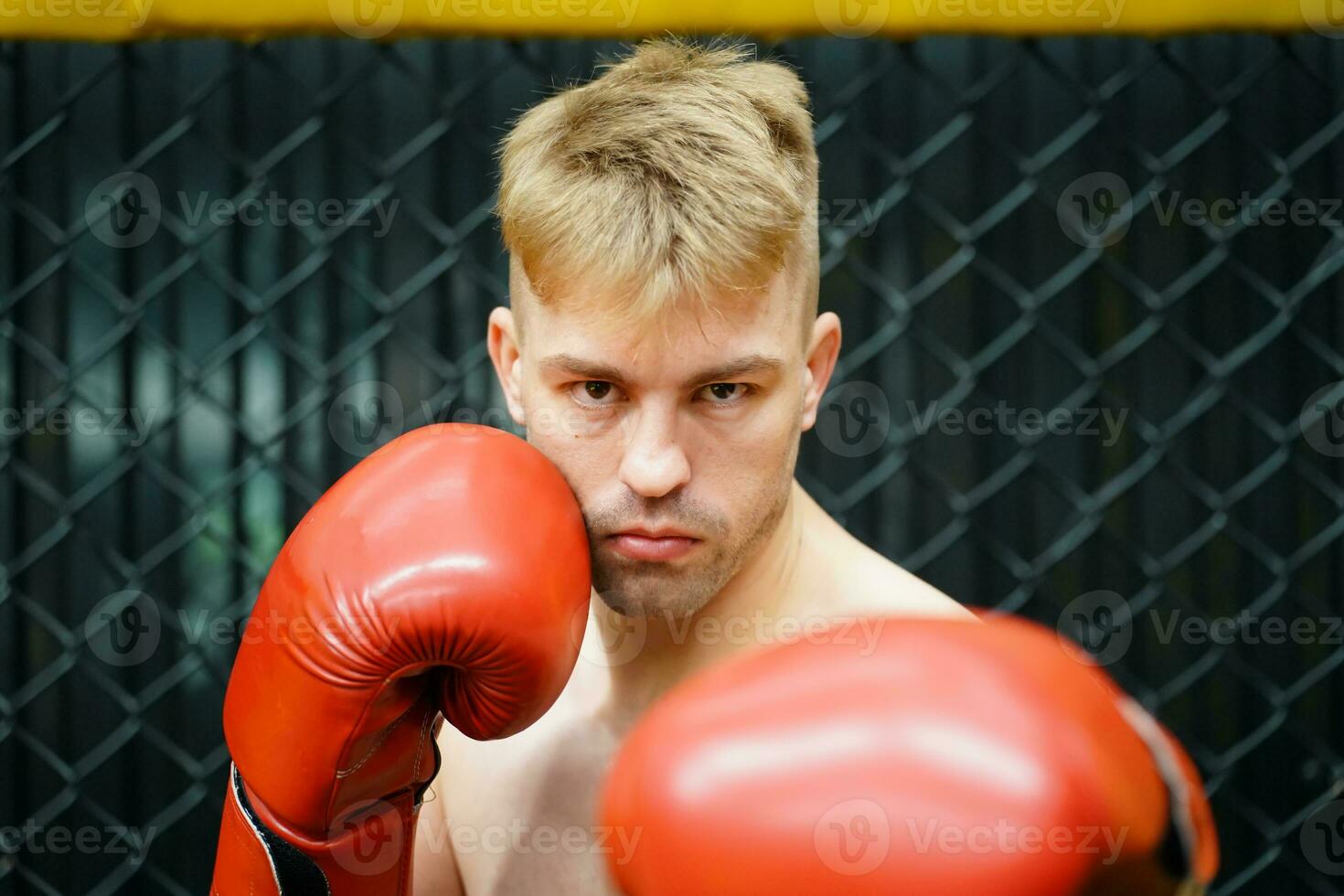 Muay Thai, The martial art of Thailand, The boxer's rehearsal punching before the real fight on the stage It prepares the body for each boxing match. photo