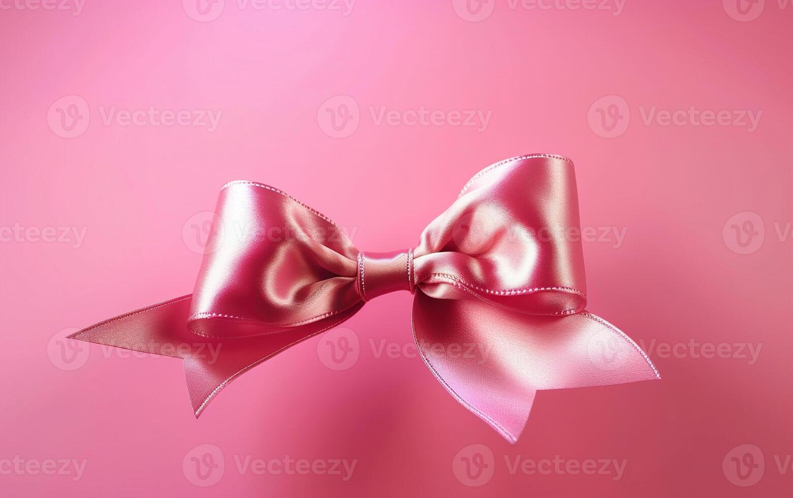 Pink bow over pink background. Happy Mothers Day. Womans day. . photo