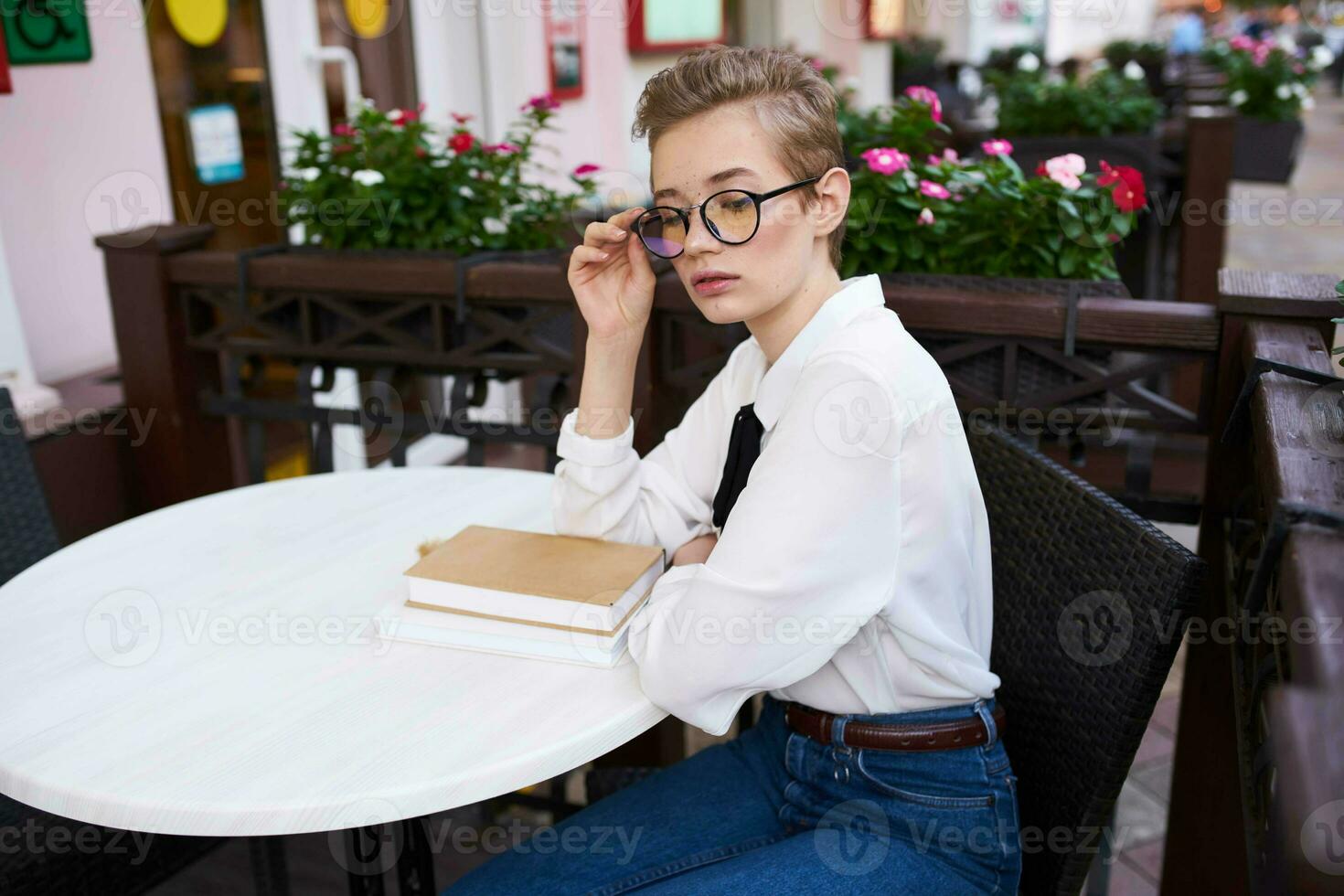 female in a summer cafe outdoors rest fun walking around town Lifestyle photo
