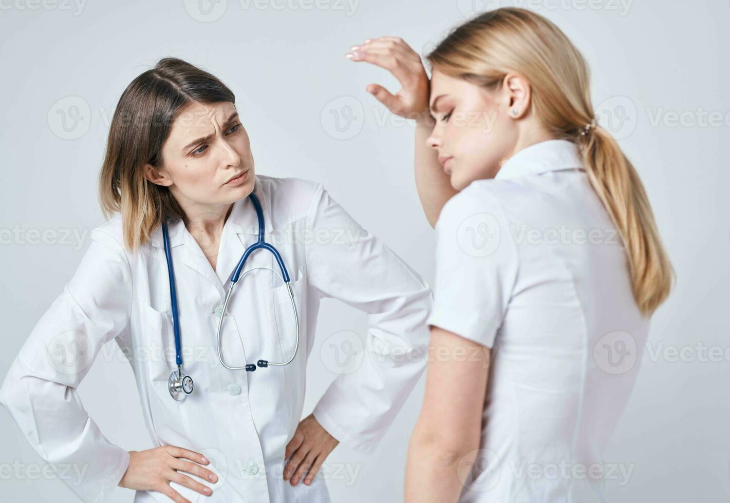 The patient came to the doctor with a stethoscope model health problems photo