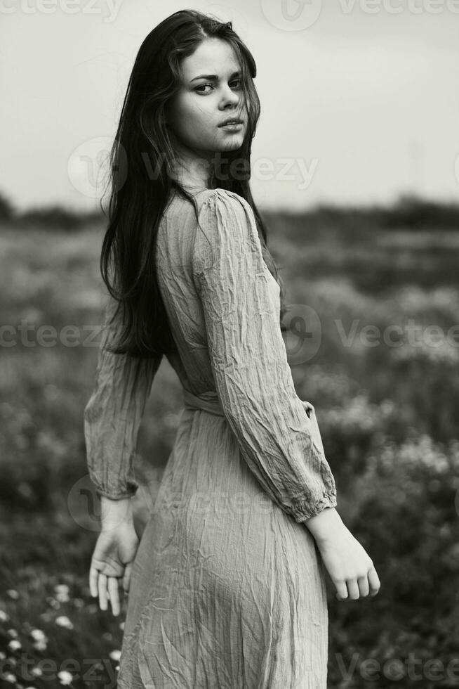 woman in dress dramatic style emotions posing black and white photo