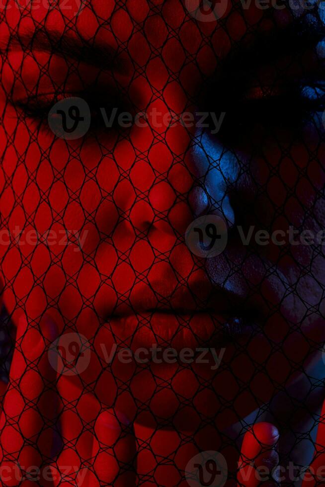 young woman posing mesh on the face neon Lifestyle unaltered photo