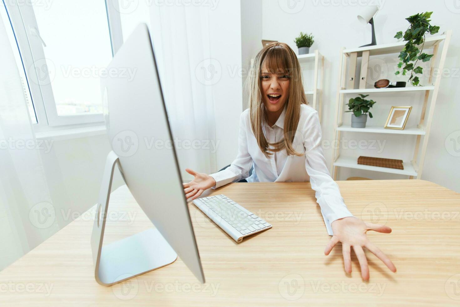 Irritated evil blonde businesswoman confused after computer software crash error at workplace spread hands at camera in modern office. Angry director work online in financial corporation. Wide angle photo