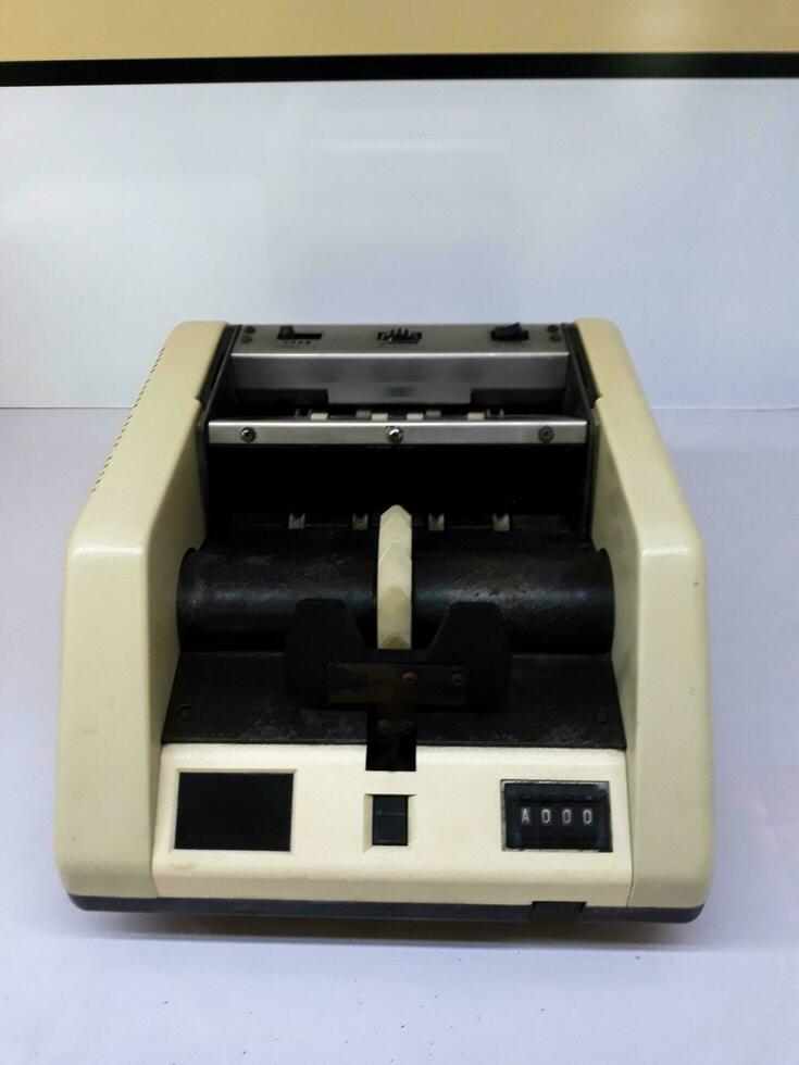 old mechanical manual counting antique machine for mathematical calculations in Museum Mandiri. JAKARTA, INDONESIA, APRIl 8, 2019 photo