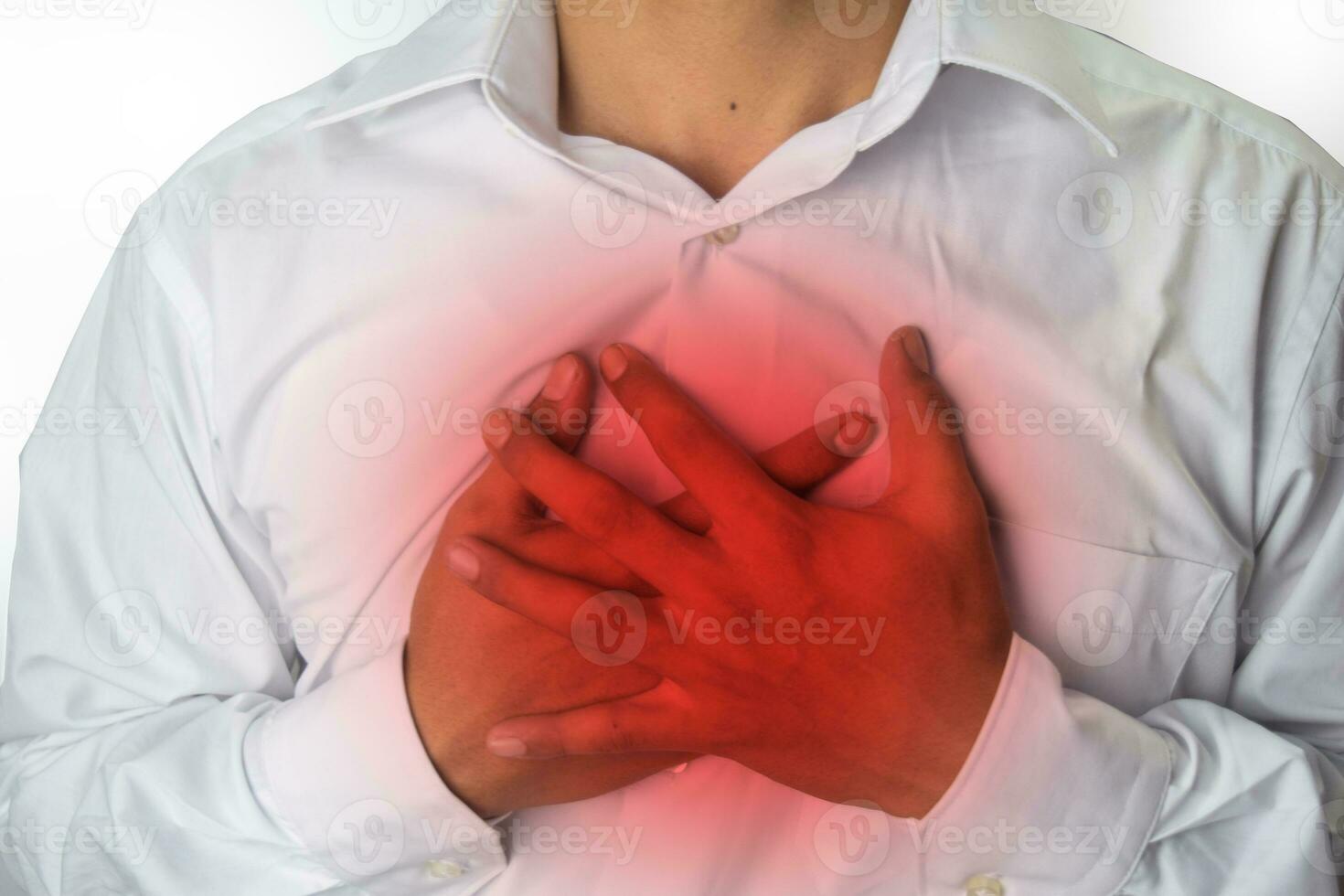 man chest pain from acid reflux or heartburn, isolated on white background photo