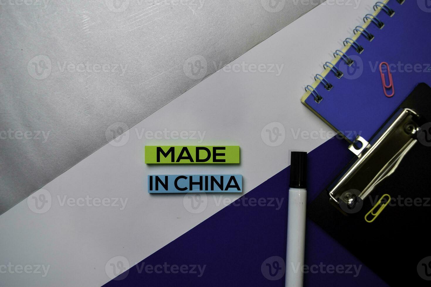 Made In China text on sticky notes with color office desk concept photo
