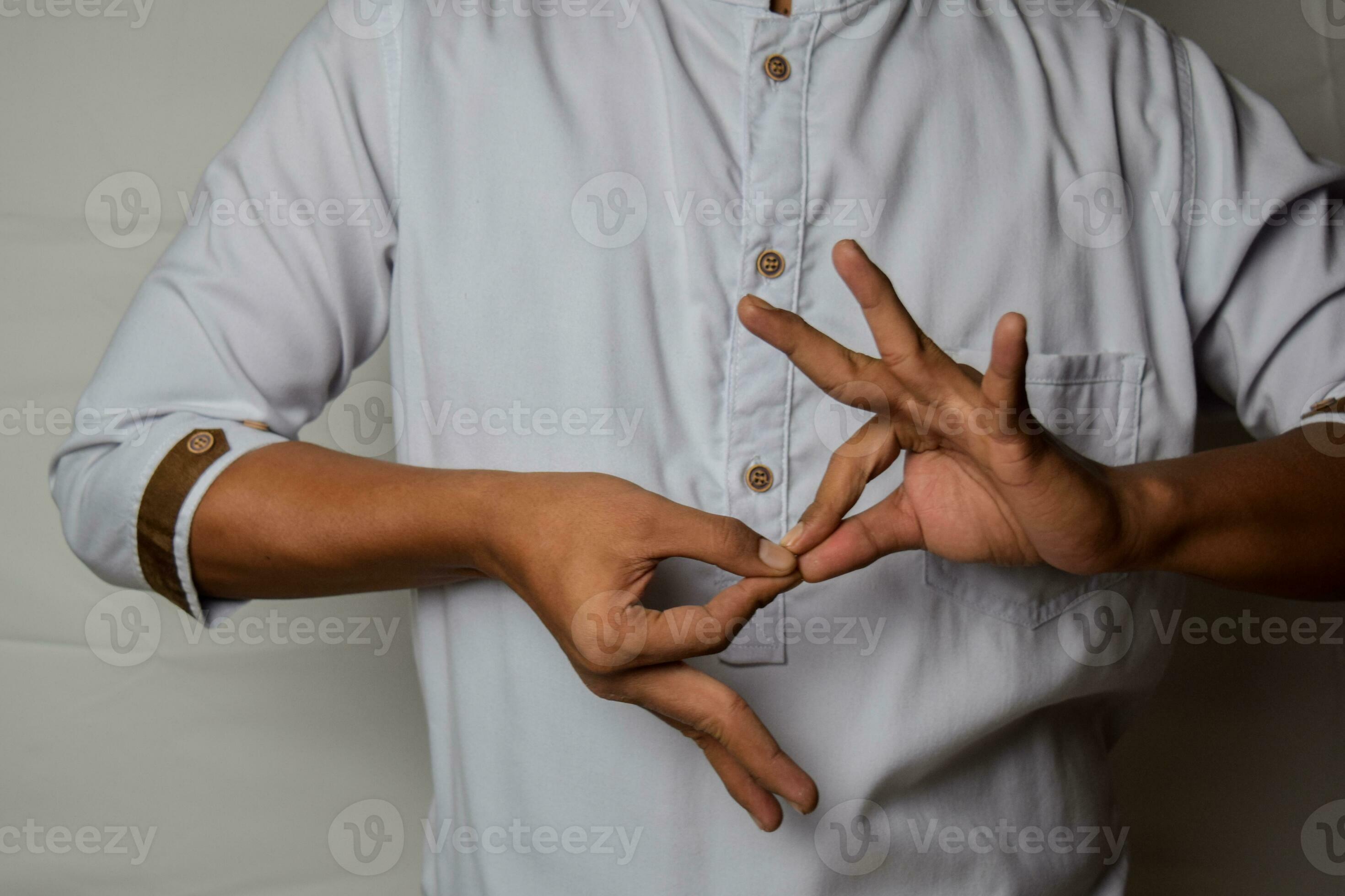 Close up Asian man shows hand gestures it means interpreter