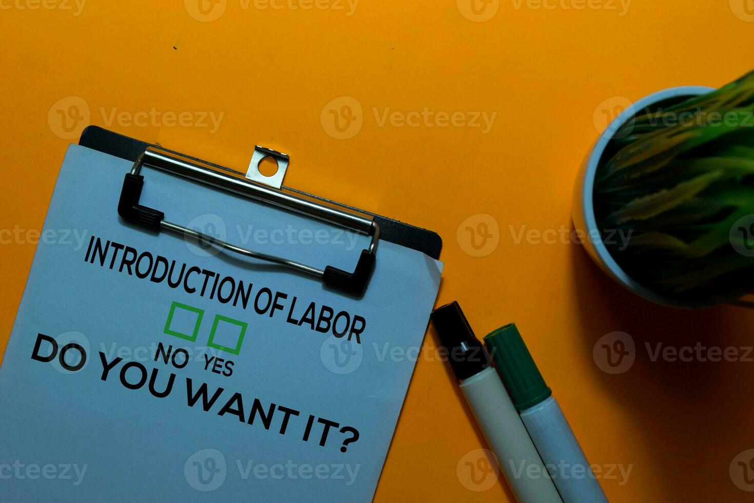 Introduction of Labor, Do You Want it Yes or No. On office desk background photo