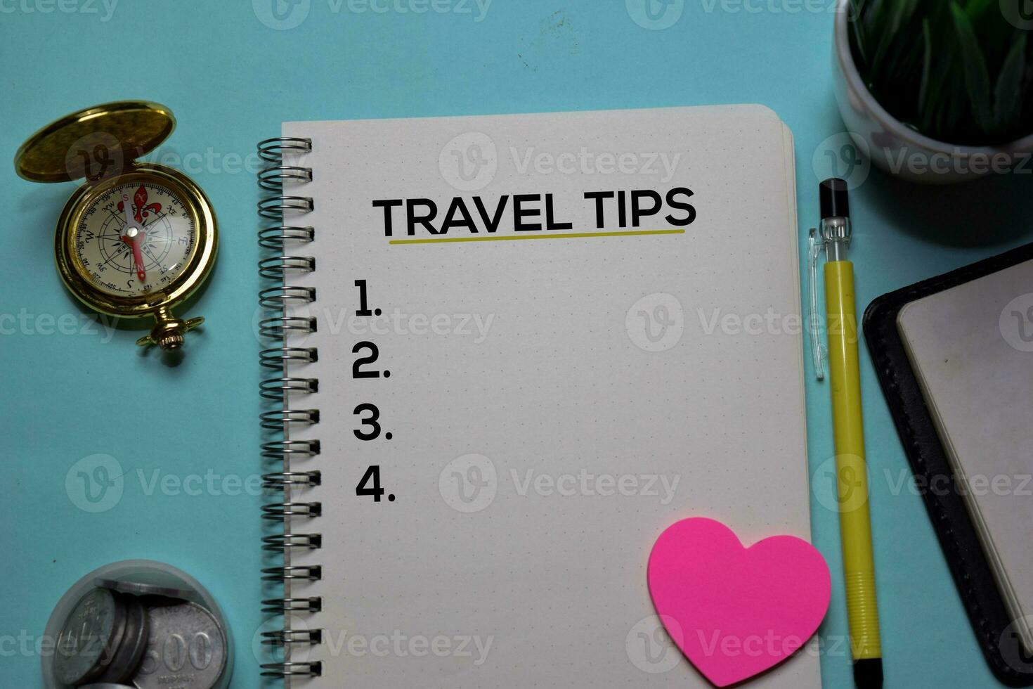 Travel Tips write on a book isolated on office desk. photo