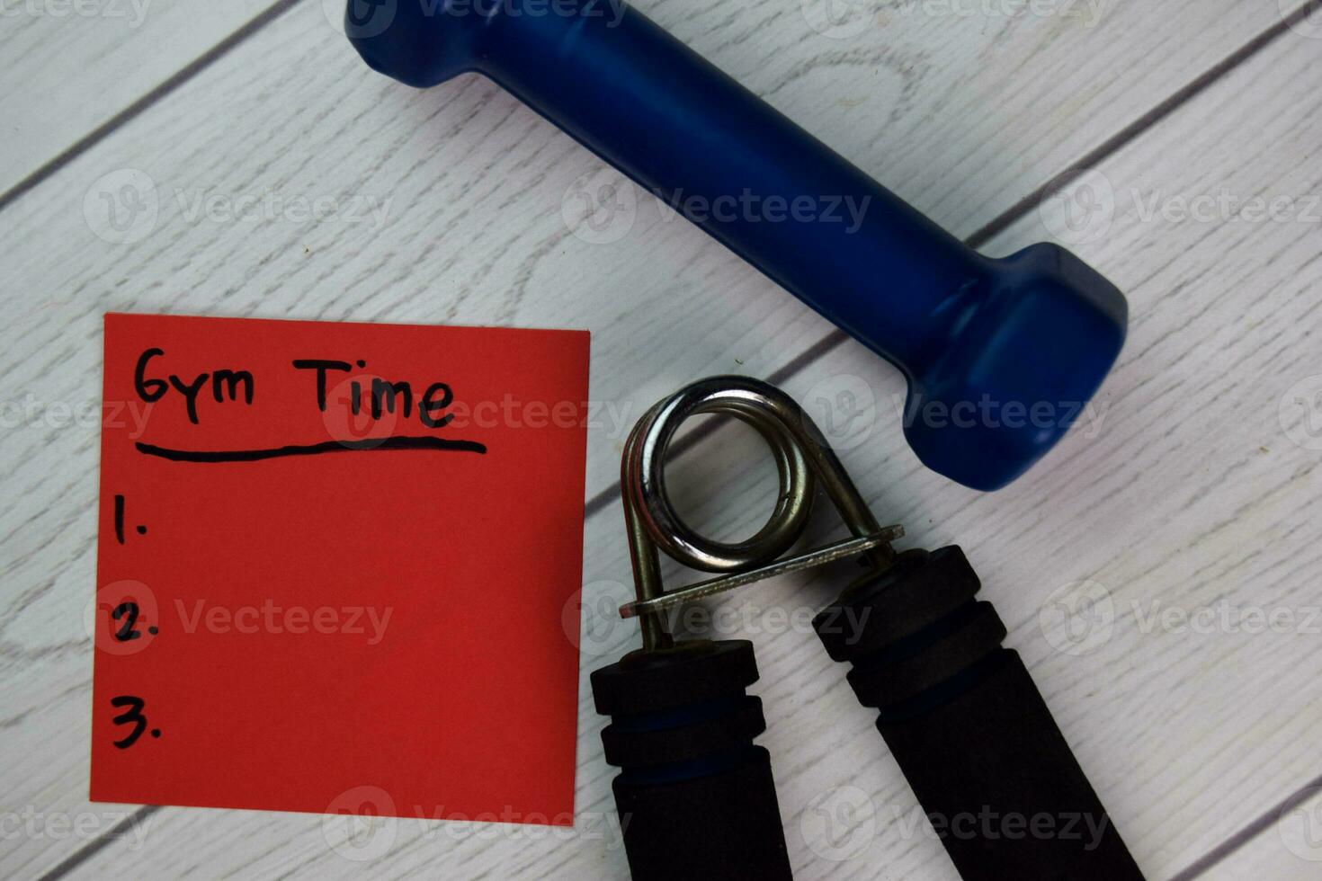 Gym Time write on sticky notes and supported by additional services isolated on Wooden Table. photo