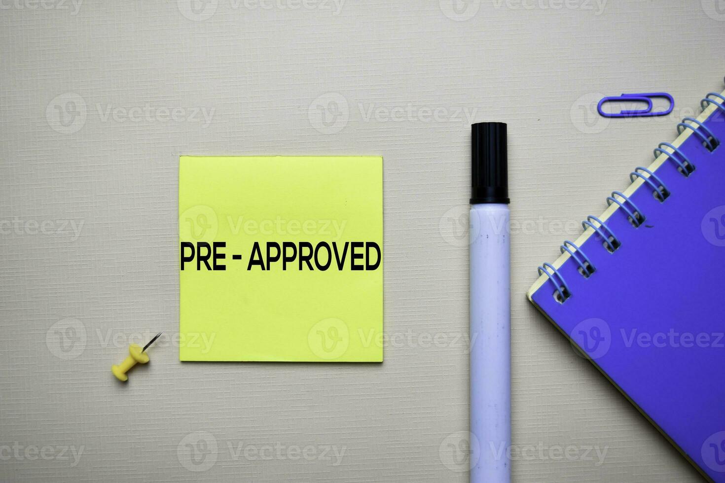 Pre - Approved text on sticky notes with office desk concept photo