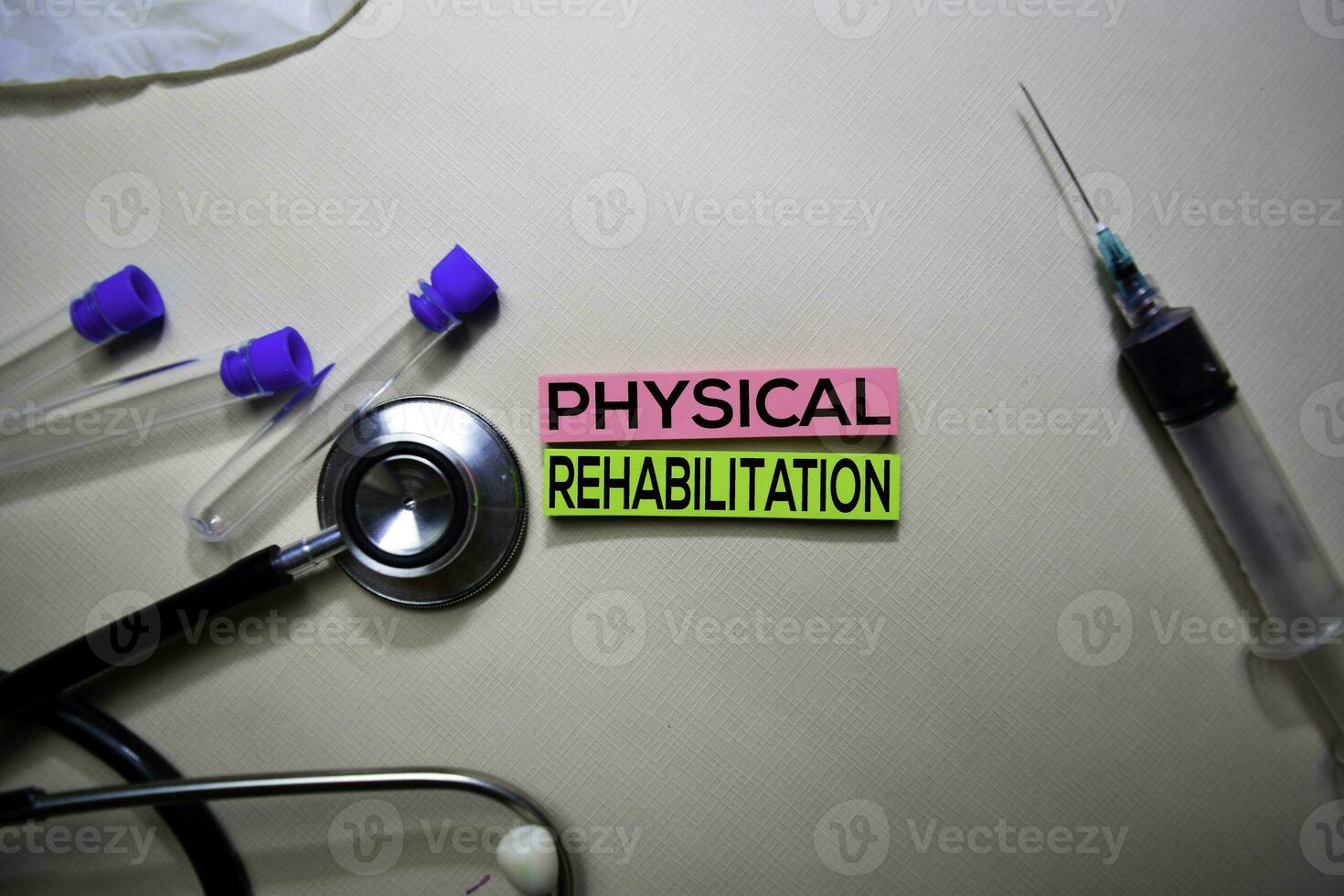 Physical Rehabilitation text on Sticky Notes. Top view isolated on office desk. Healthcare Medical concept photo