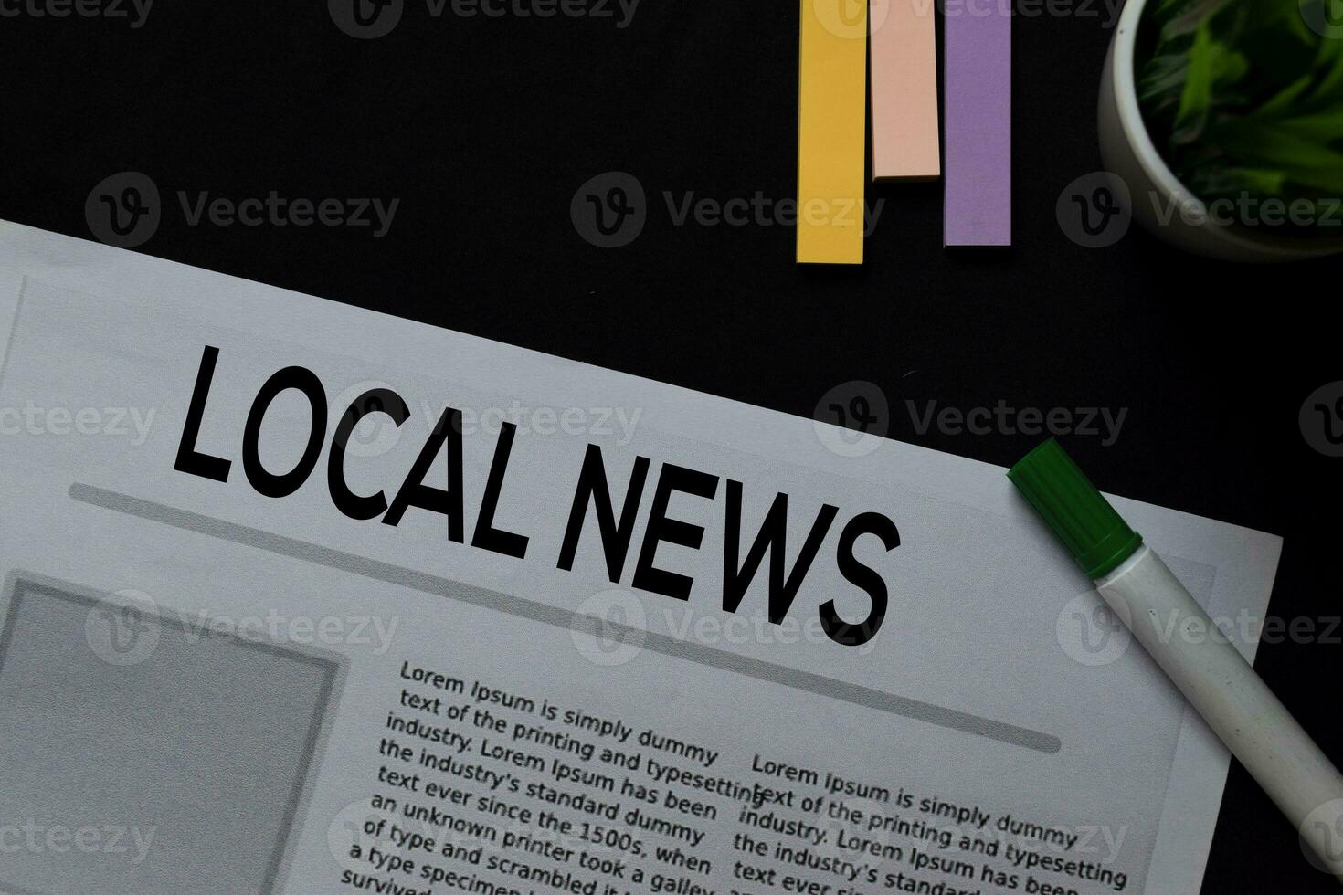 Local News text in headline isolated on Black background. Newspaper concept photo