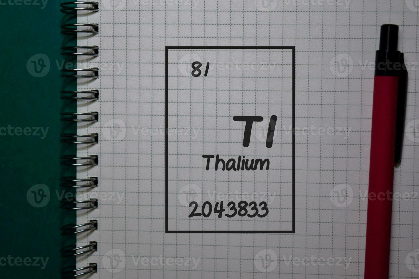Thallium - TI. write on a book isolated on Office Desk photo