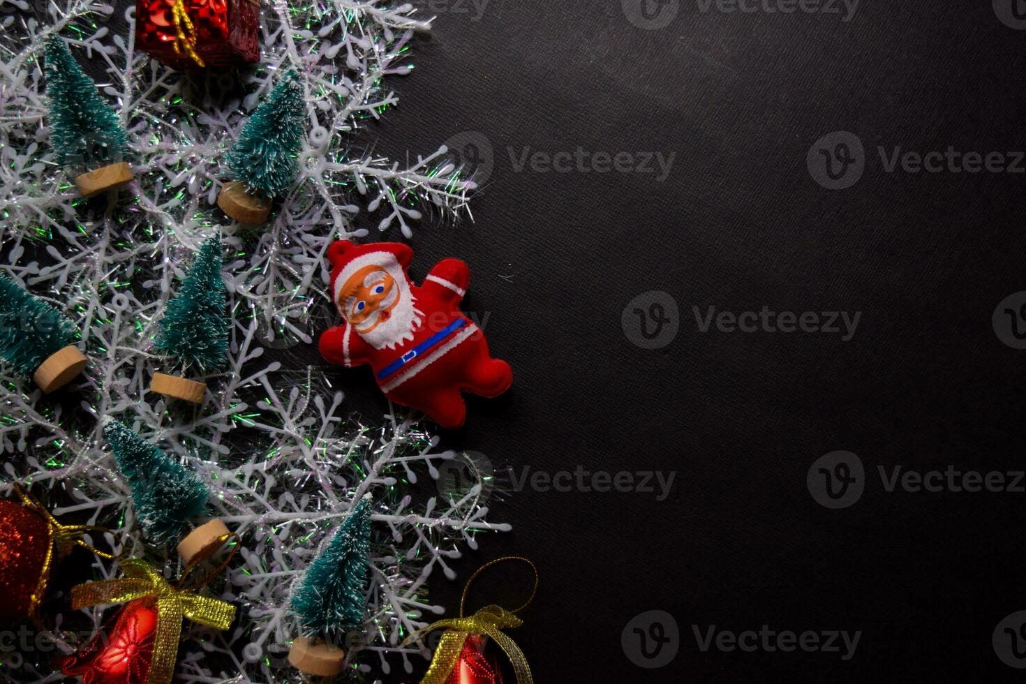 Decorative Christmas and santa claus isolated on black background photo