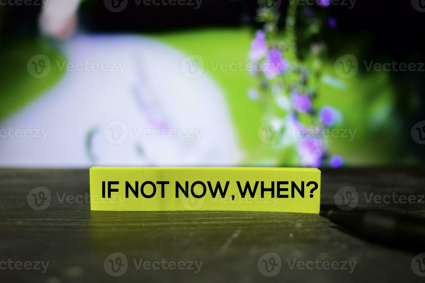 If Not Now, When on the sticky notes with bokeh background photo