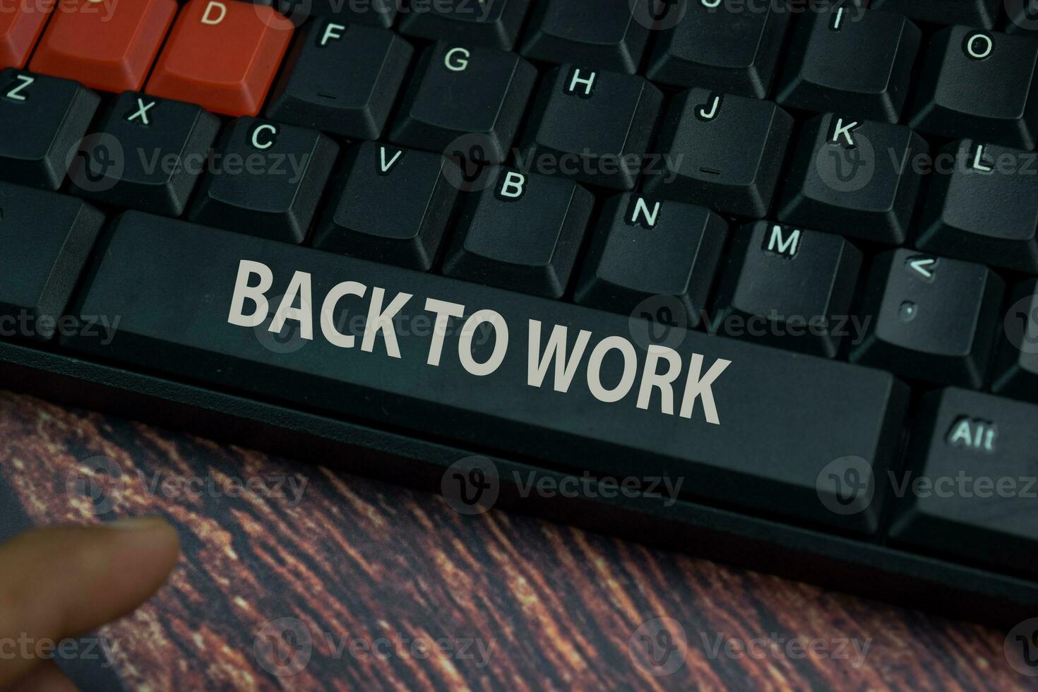 Back to Work isolated on laptop keyboard background. photo