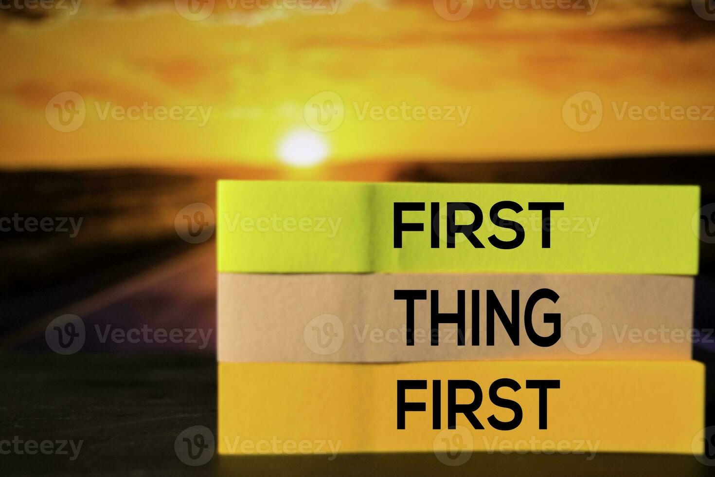 First Thing First on the sticky notes with bokeh background photo