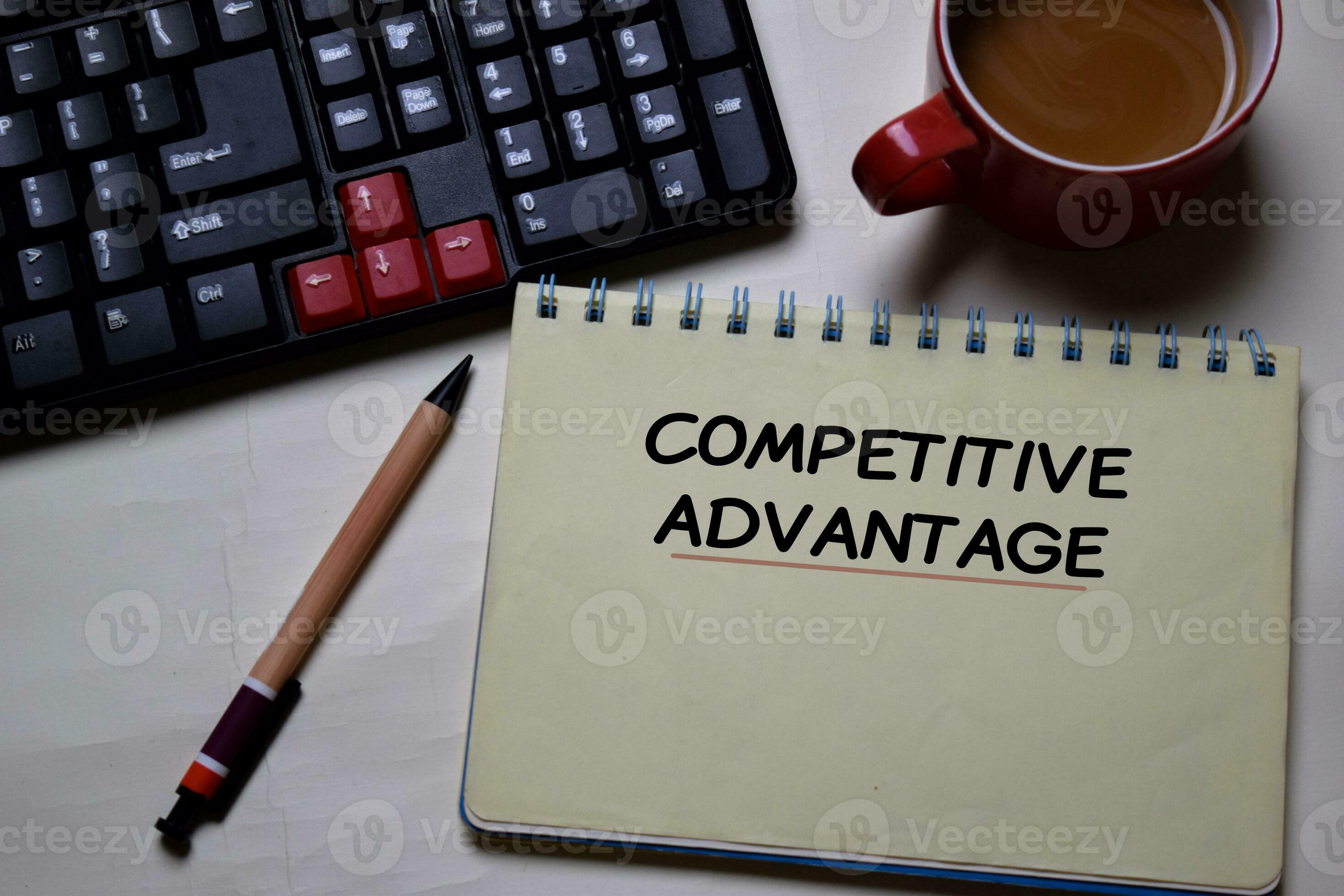 Competitive Advantage write on a book isolated on office desk. 23635280