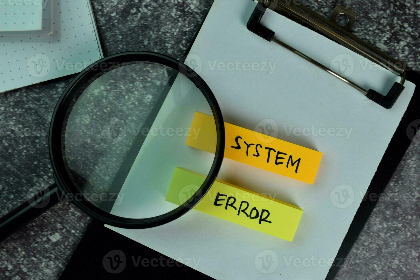 System Error write on sticky notes on the table. photo