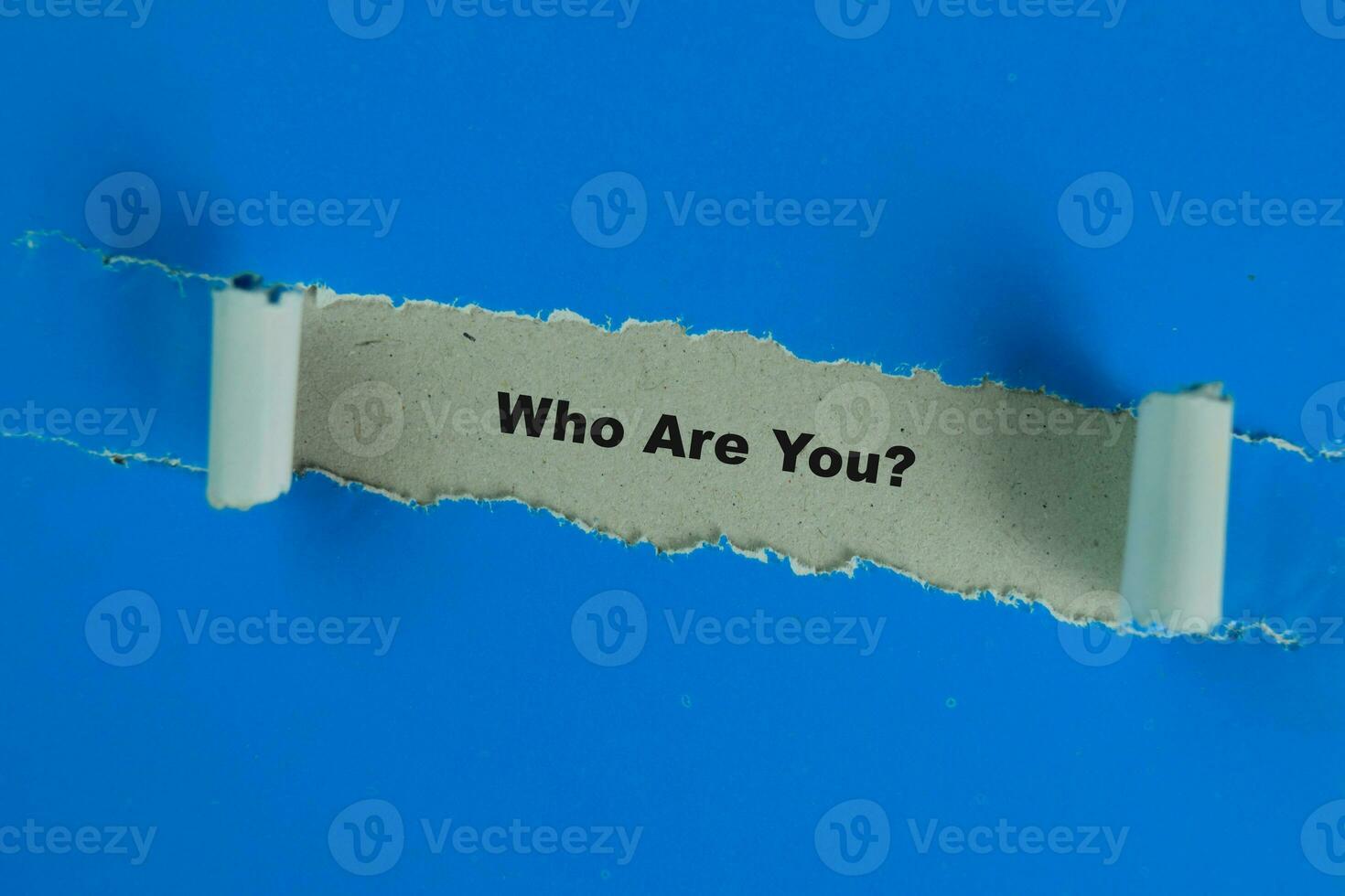 Who Are You Text written in torn paper photo