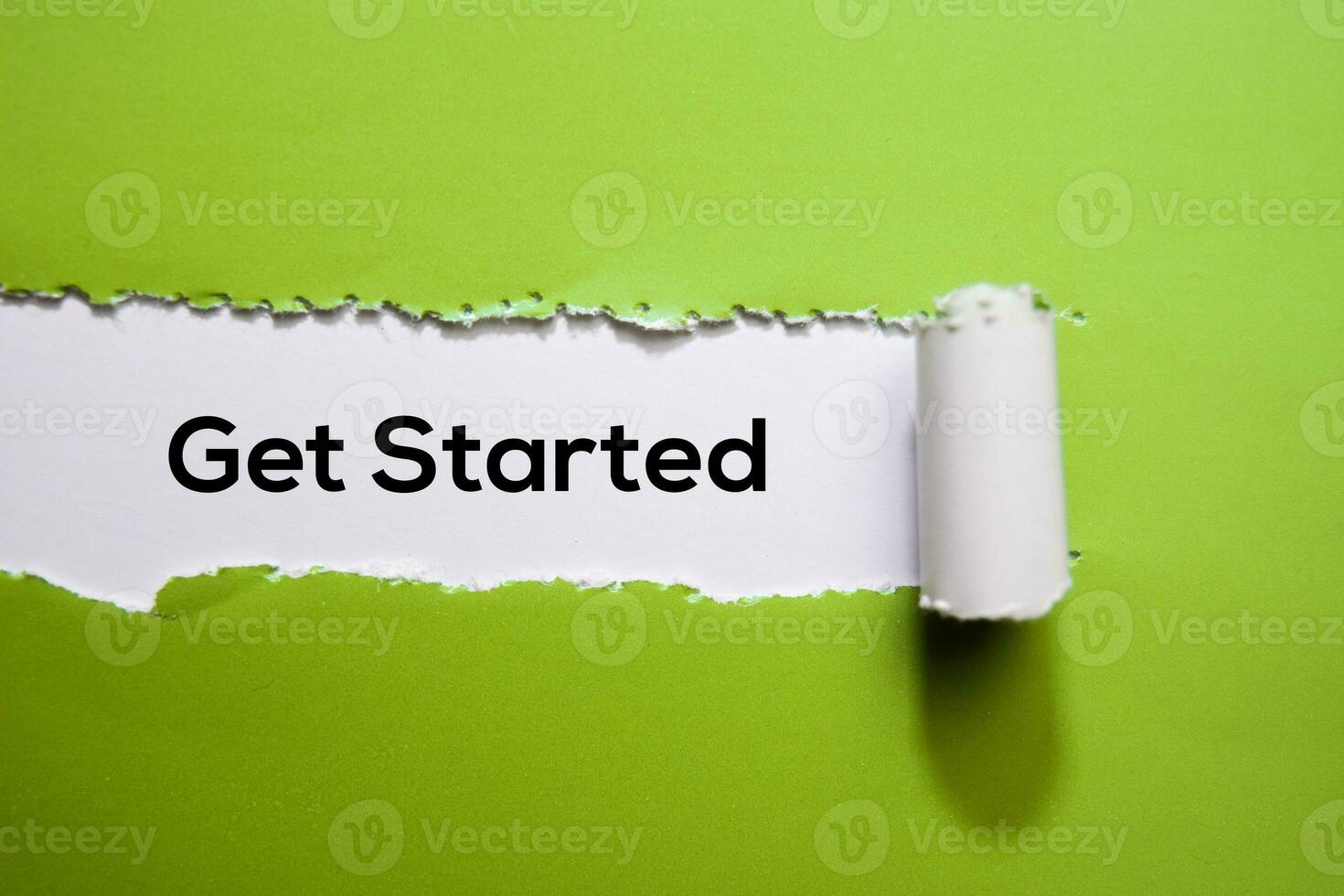 Get Started Text written in torn paper photo
