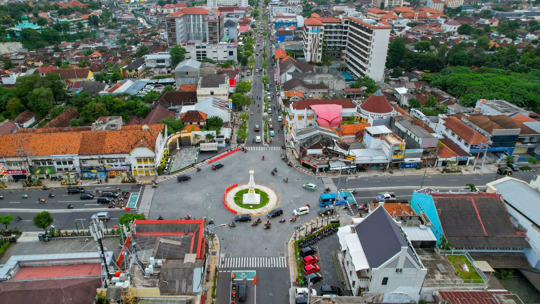 Aerial view of the tugu jogja or known as tugu pal is the iconic landmark of Yogyakarta. Central Java, Indonesia, December 6, 2021 photo
