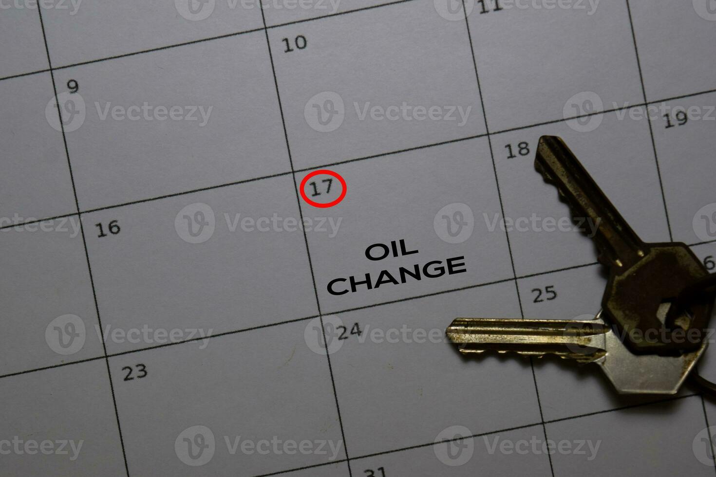 Oil Change write on calendar. Date 17. Reminder or Schedule Concepts photo