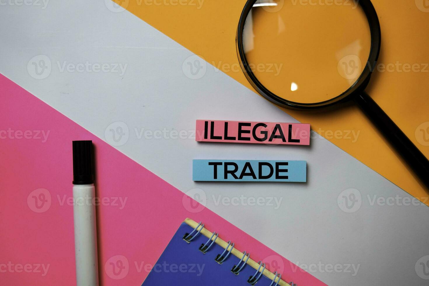 Illegal Trade text on sticky notes with color office desk concept photo