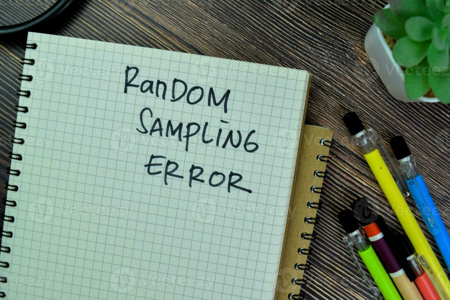 Concept of Random Sampling Error write on a book isolated on Wooden Table. photo