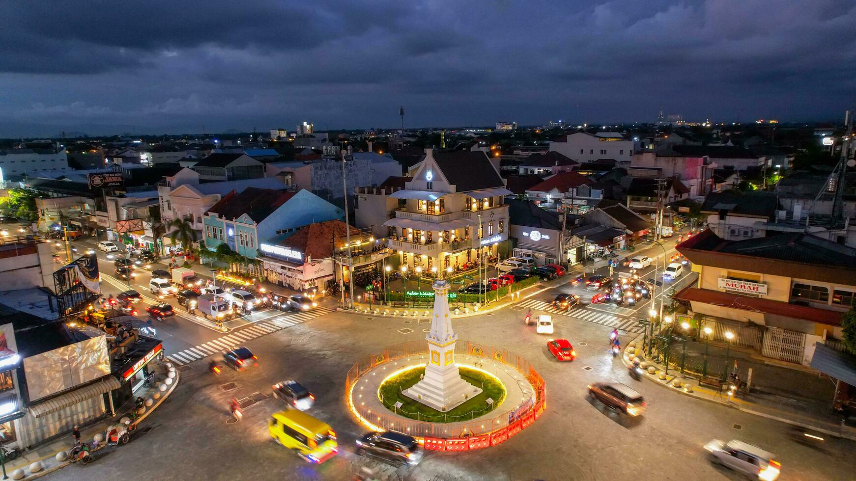 Aerial view of the tugu jogja or known as tugu pal is the iconic landmark of Yogyakarta. Central Java, Indonesia, December 6, 2021 photo