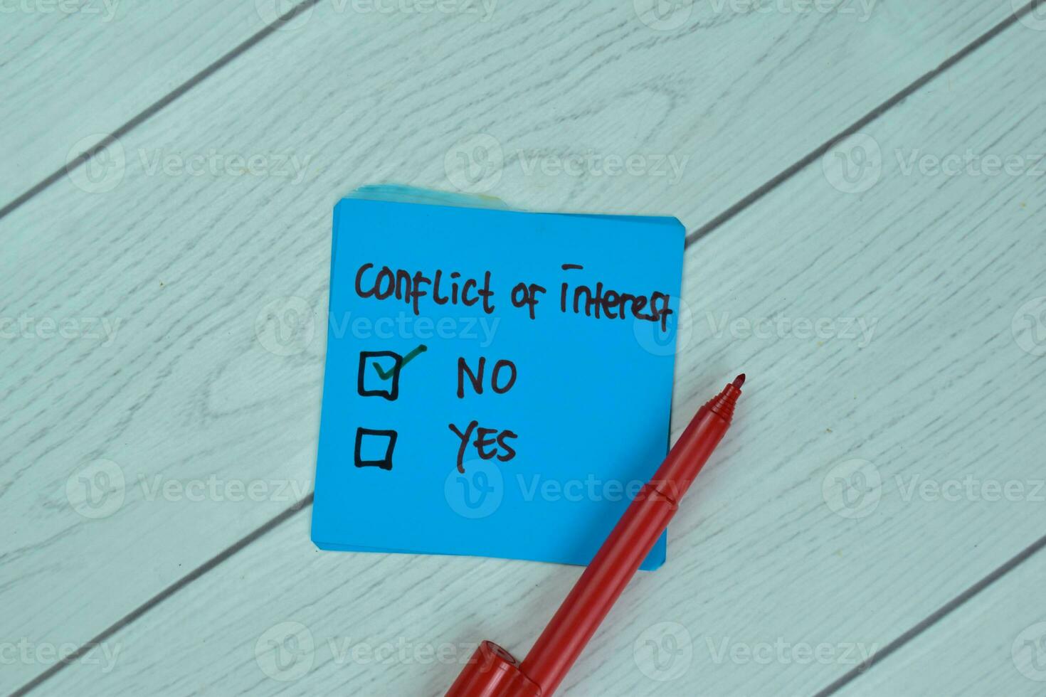 Concept of No Conflict of Interest write on sticky notes isolated on Wooden Table. photo