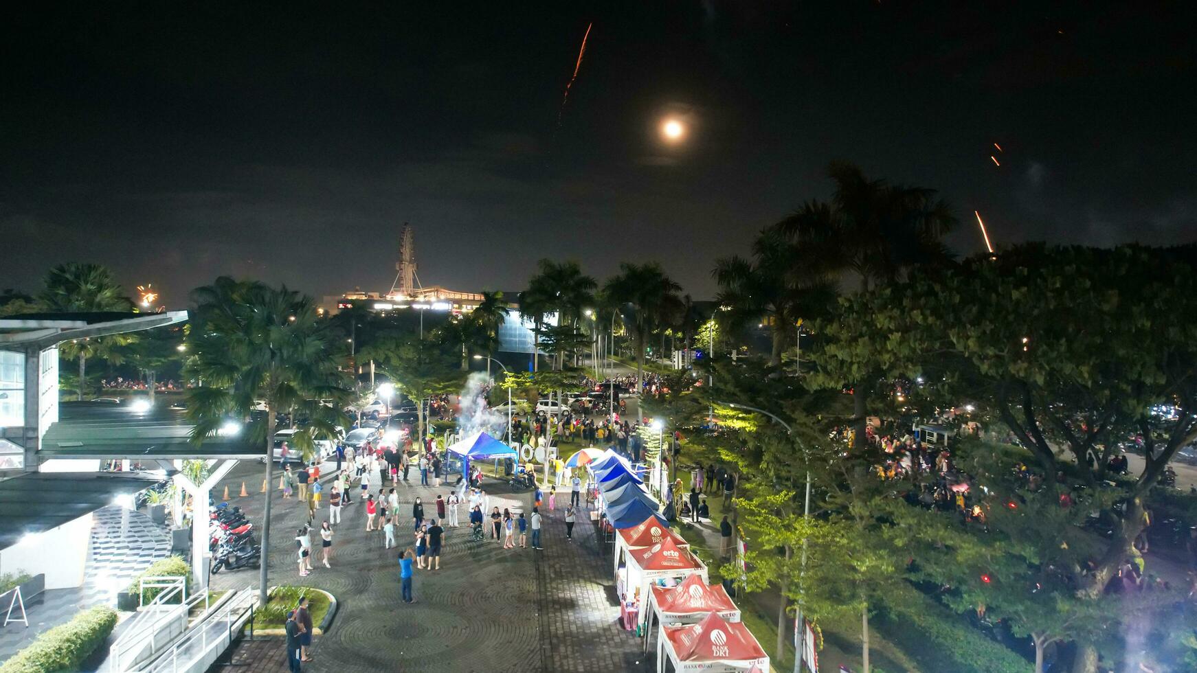 Aerial view of The AEON MALL Jakarta Garden City at night, AEON is a Largest shopping mall in East Jakarta. Jakarta, Indonesia, January 24, 2023 photo