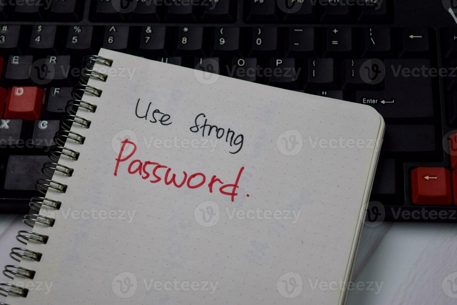 Use Strong Password write on a book isolated on keyboard computer photo
