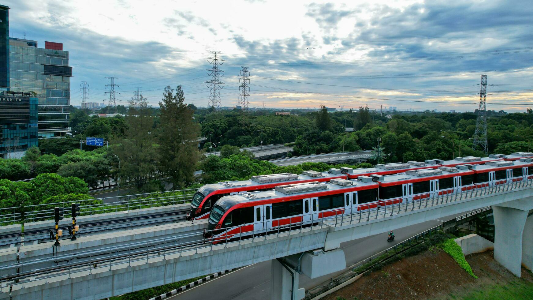 Aerial view of Jakarta LRT train trial run for phase 1 from UKI Cawang. Jakarta, Indonesia, March 8, 2022 photo